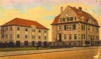 Kolorierte historische Postkarte desselben Eckhauses.